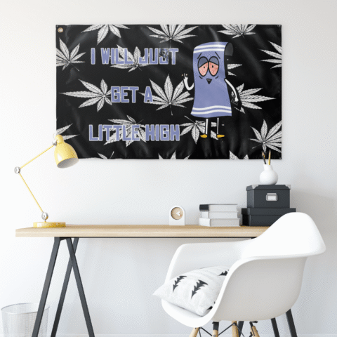 Black cartoon anthropomorphic rave flag hung above a desk showing leaf print and stoned towel