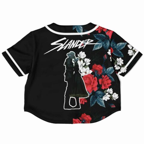 Back view of the black rave cropped baseball jersey with a floral pattern and bold text