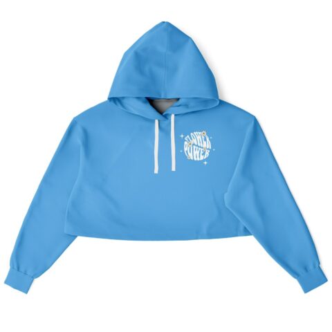 Front view of the sky blue flower power rave cropped hoodie with a chest badge