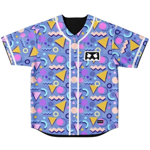 Periwinkle blue geometric pattern jersey with pink circles, yellow triangles, and chest emblem, front view