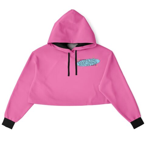 Front view of the pink rave cropped hoodie with the Attracting Good Things Into My Life badge