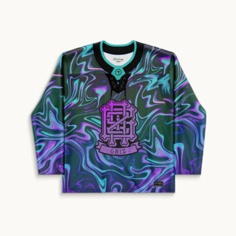 Purple liquid marble front view with cyan swirls, lace-up collar, and ornate festival crest