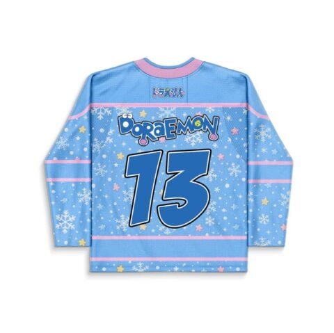 Blue snowflake-pattern jersey with pastel stars, pink trim, and bold number 13, back view