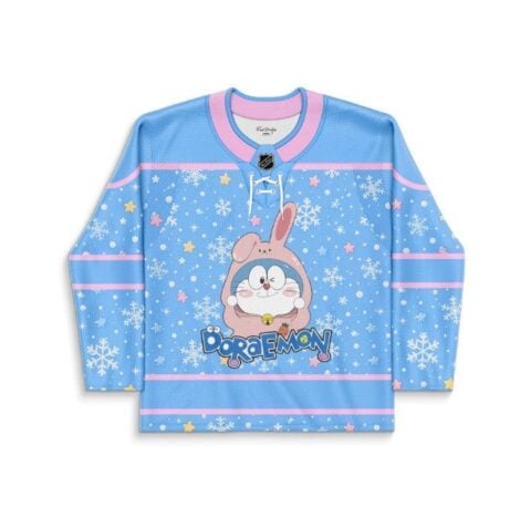 Blue anime-inspired jersey with bunny-hooded cartoon cat, snowflakes, pastel stars, and pink trim, front view